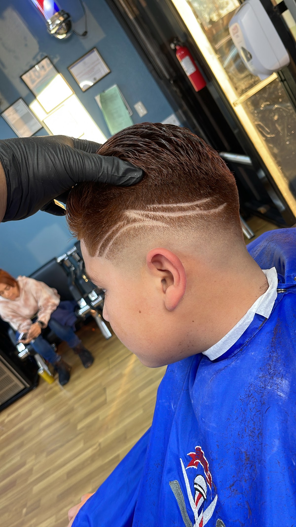 Razor design lines with a skin fade and a color treatment